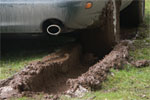 Jaguar XJ8 (X308). Do not park your 1 700 kg heavy car on a water soaked lawn.